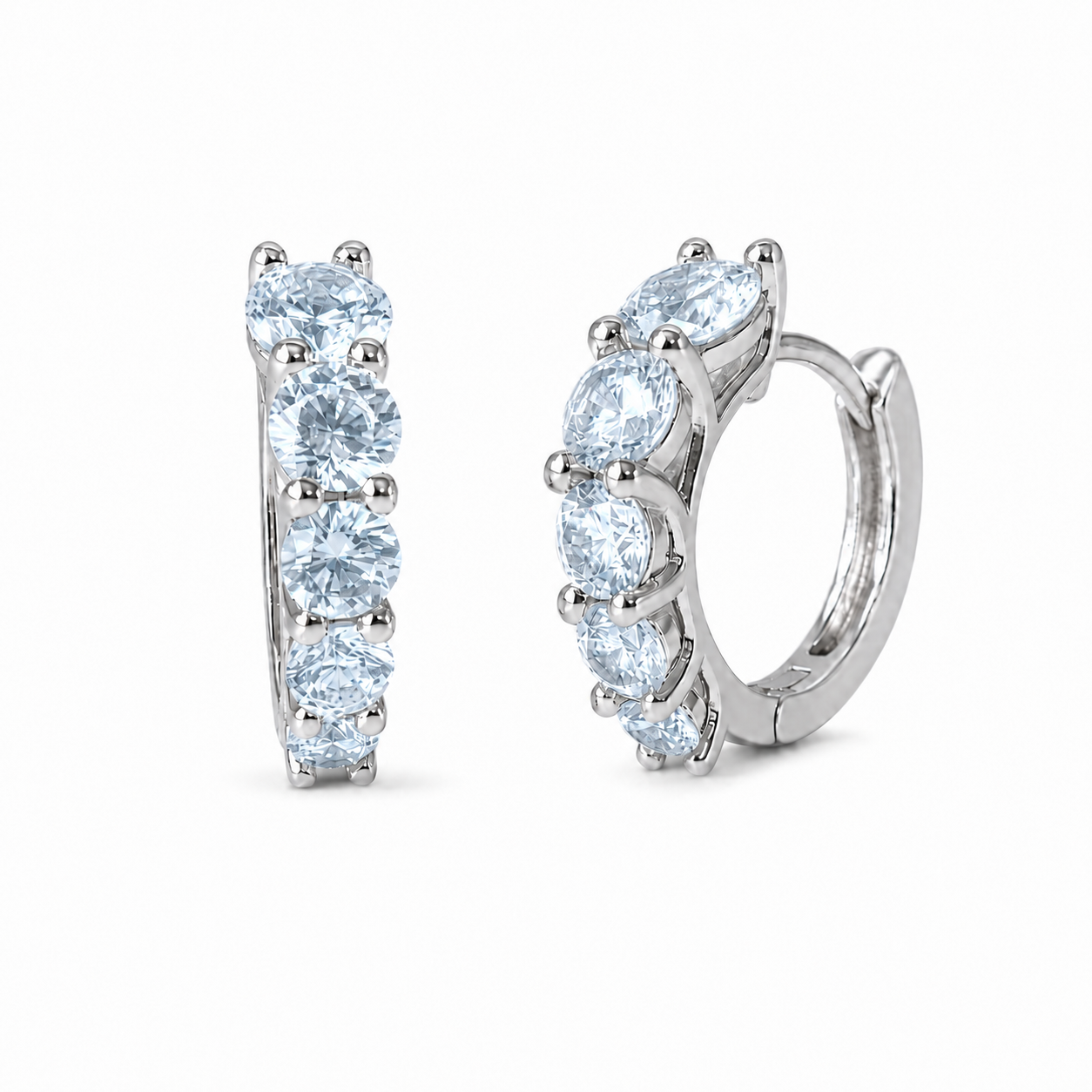 Brinco argola Isabel zircônias água marinha ródio branco