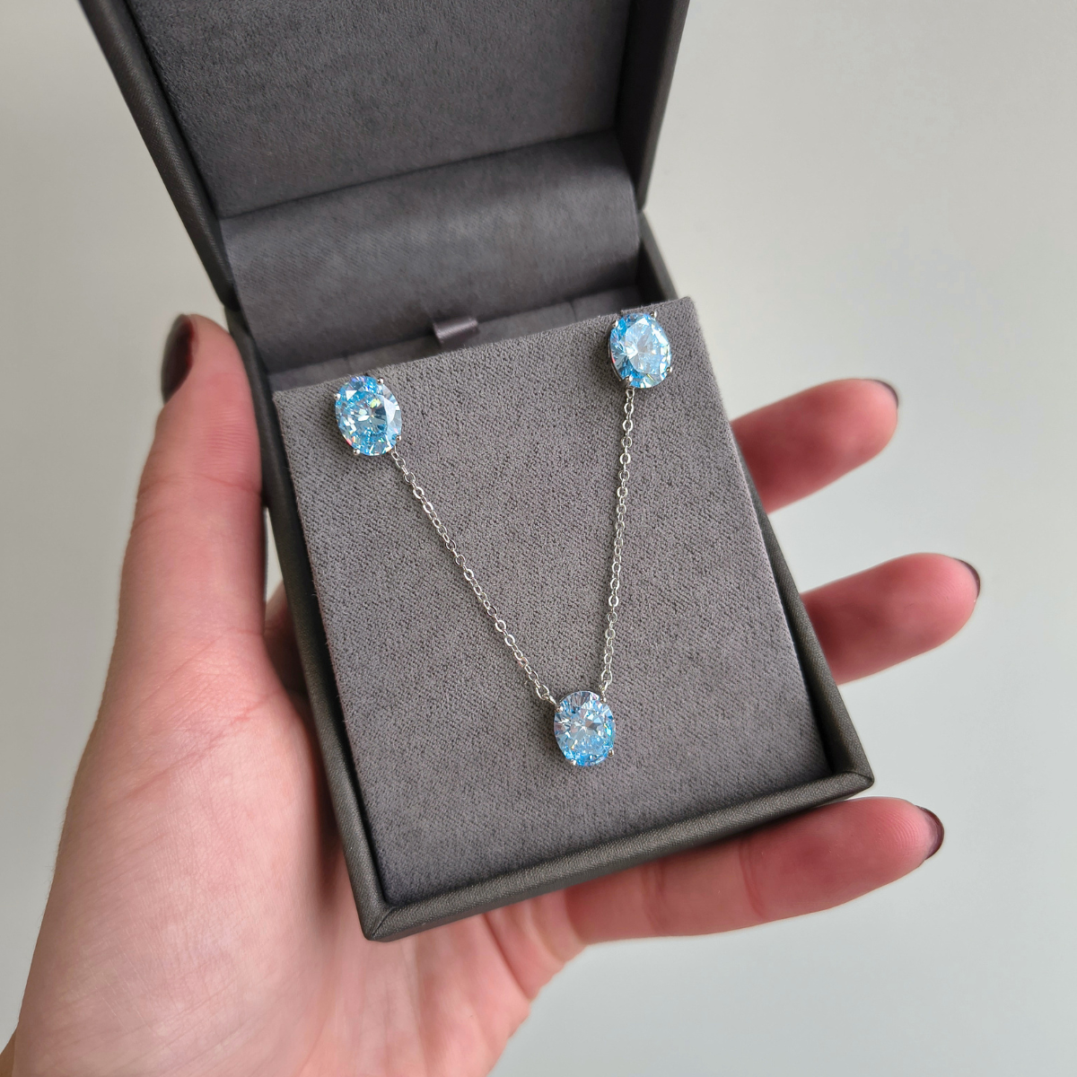 Conjunto Alexa oval zircônia sky blue ródio branco